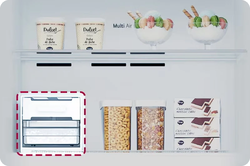 Movable ice maker freeing freezer storage space