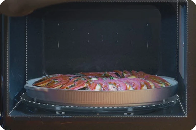 A large dish fitting inside the spacious LG NeoChef microwave.