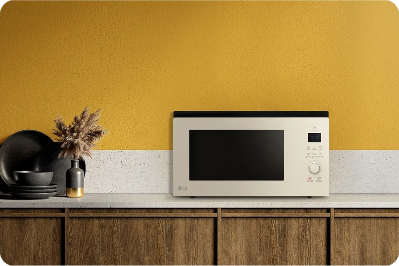 Mist Beige LG NeoChef Objet Collection microwave harmonising with a modern kitchen interior.