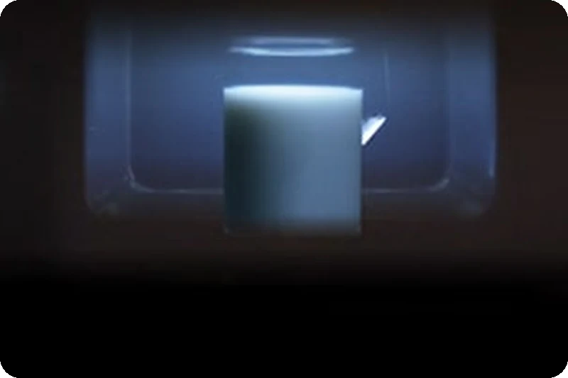 The LG NeoChef microwave interior illuminated by its LED lamp.